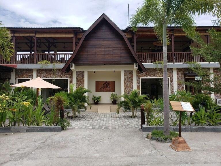 Swimming pool and tropical gardens at Bruga Villas Lombok near Selong Belanak Beach