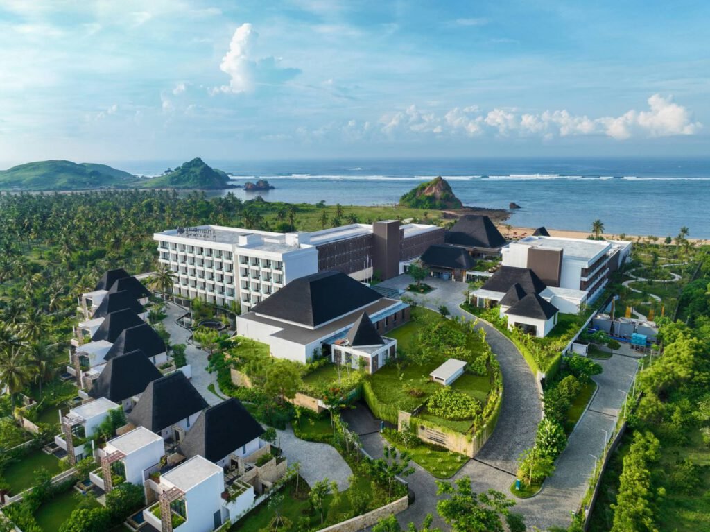 Infinity pool at Pullman Lombok Merujani Mandalika Beach Resort overlooking the Indian Ocean in Kuta Lombok